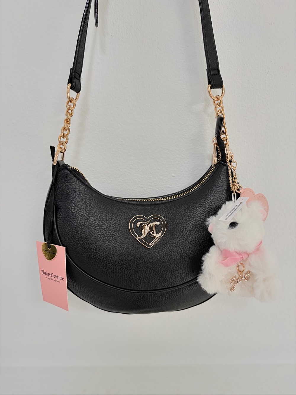 Juicy Couture Black Crescent Shoulder Bag with Gold Heart Logo and Plush Charm